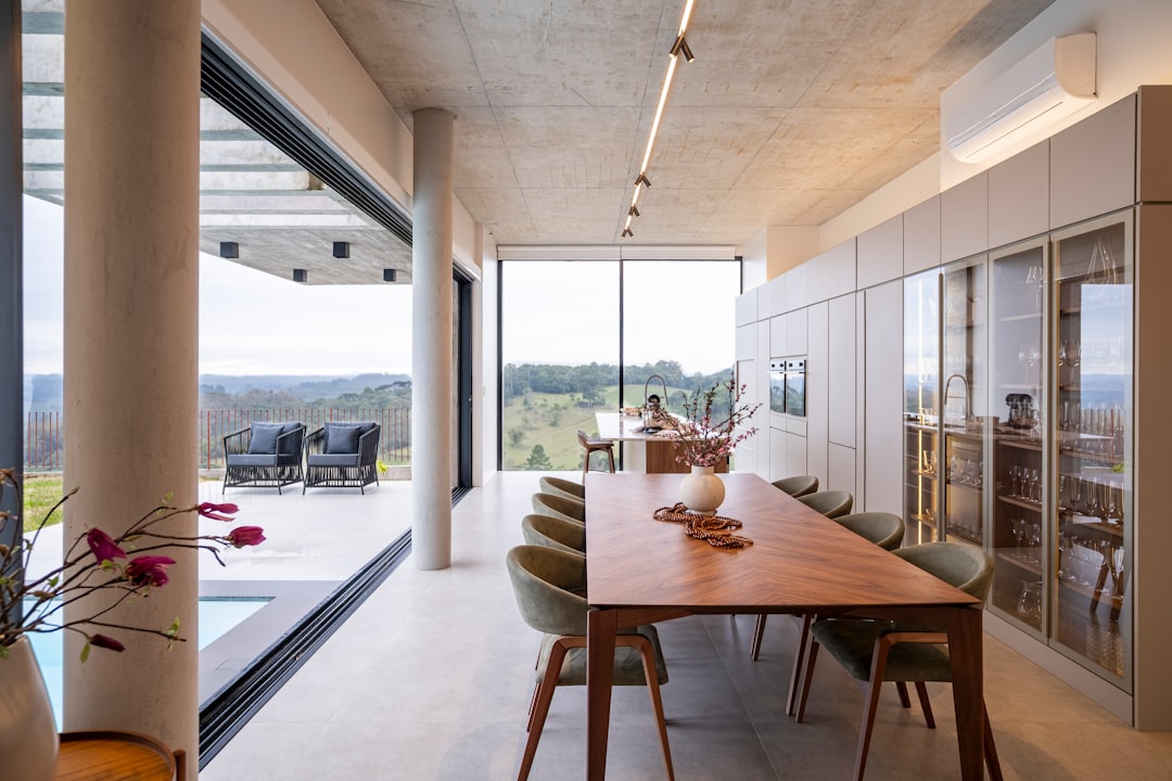 Modern outdoor estate with geometric pool and minimal hardscape