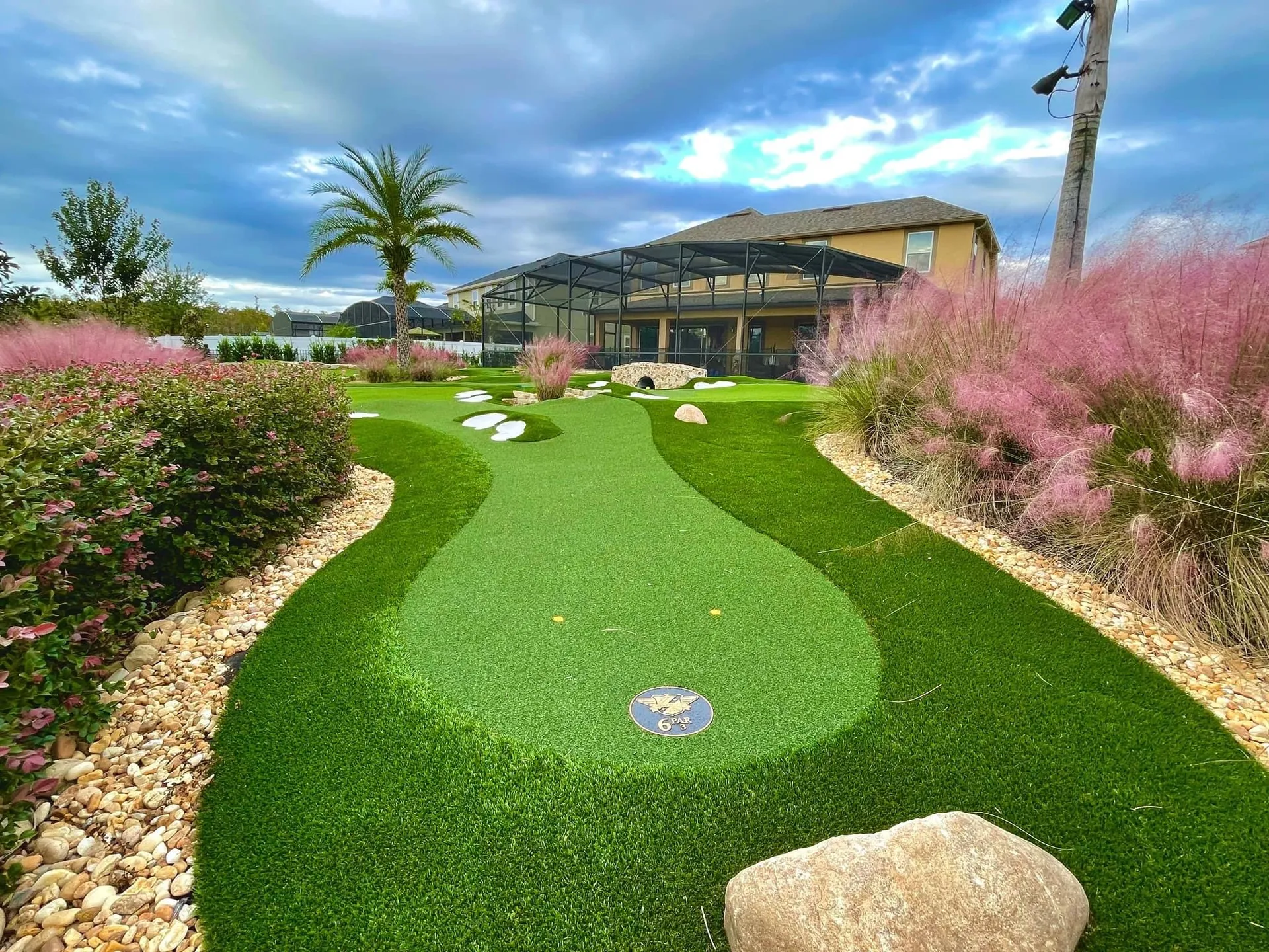 Private estate mini golf course with tropical planting — Southwest Florida