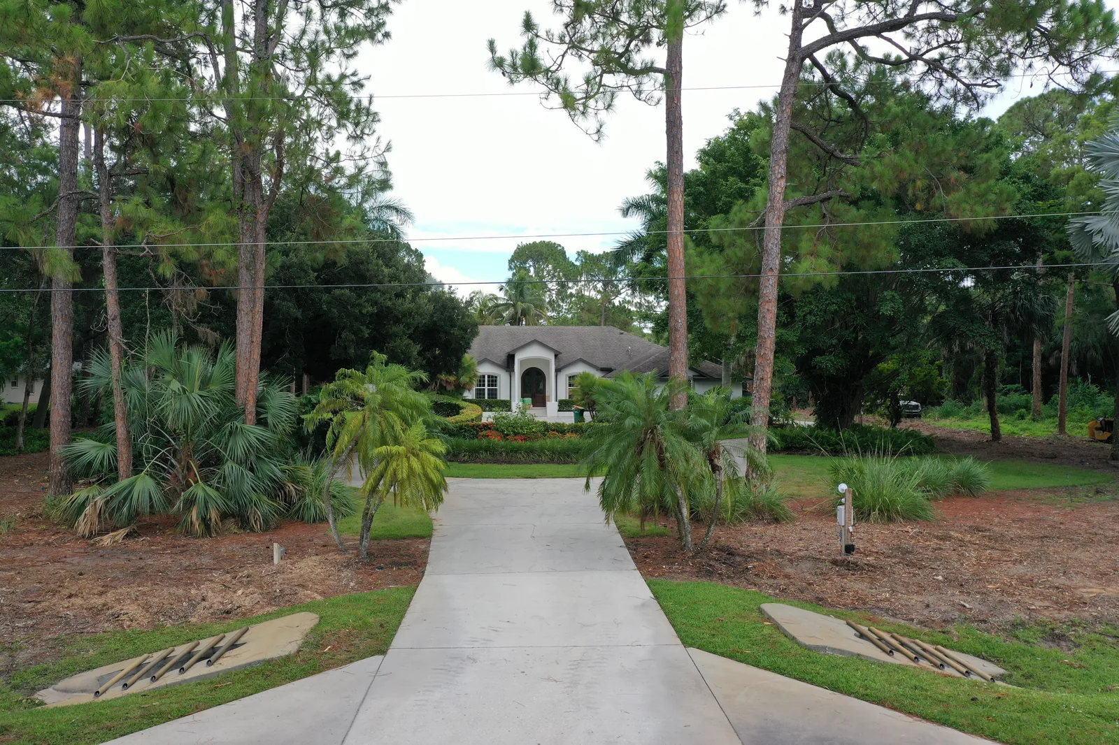 East Naples drive corridor after ROW clearing and grade cleanup