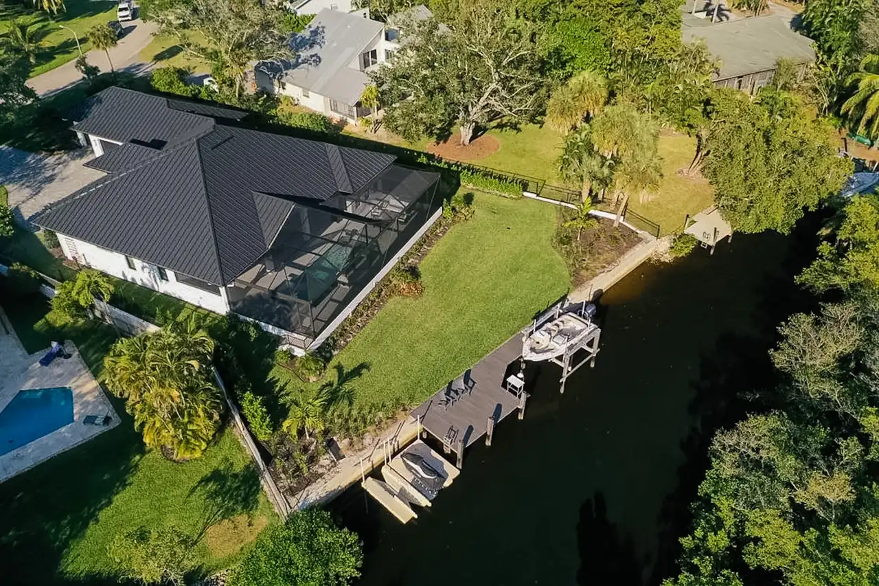 Dock and waterfront construction at Naples estate by Precision Landscaping and Design