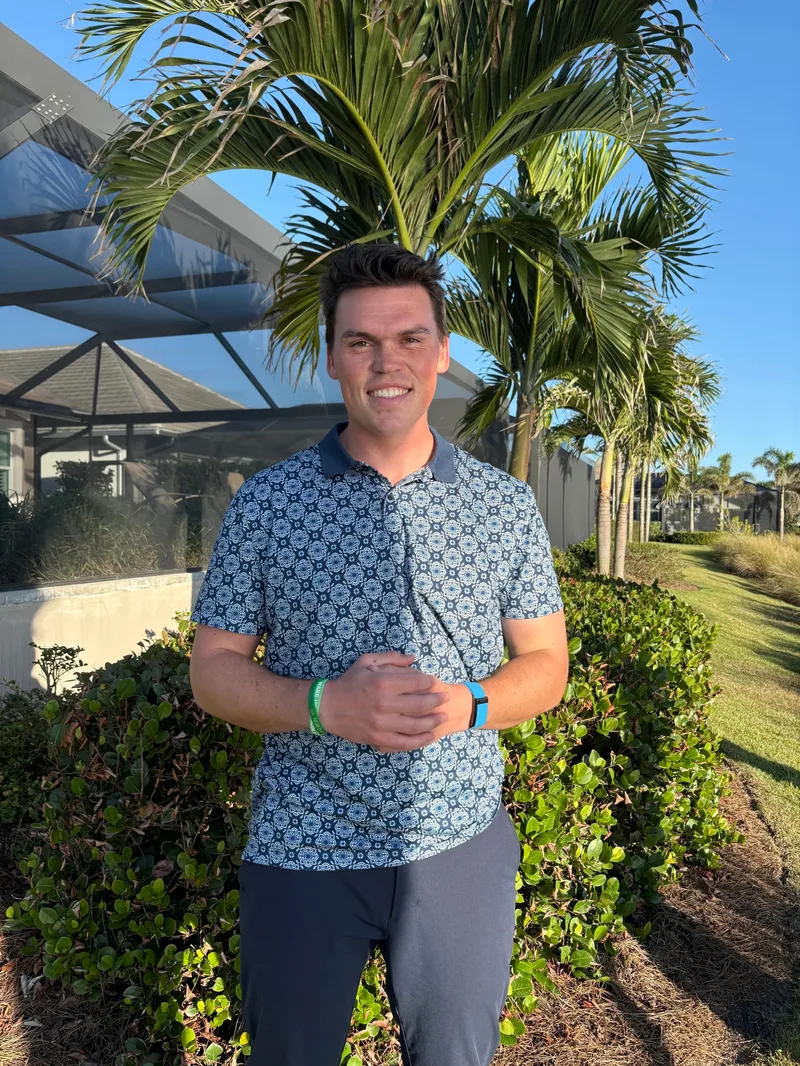 Thomas — Principal of Precision Landscaping & Design, on-site at a Naples estate build